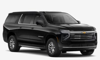 A black Chevrolet SUV with a sleek design, featuring a spacious interior and modern headlights.